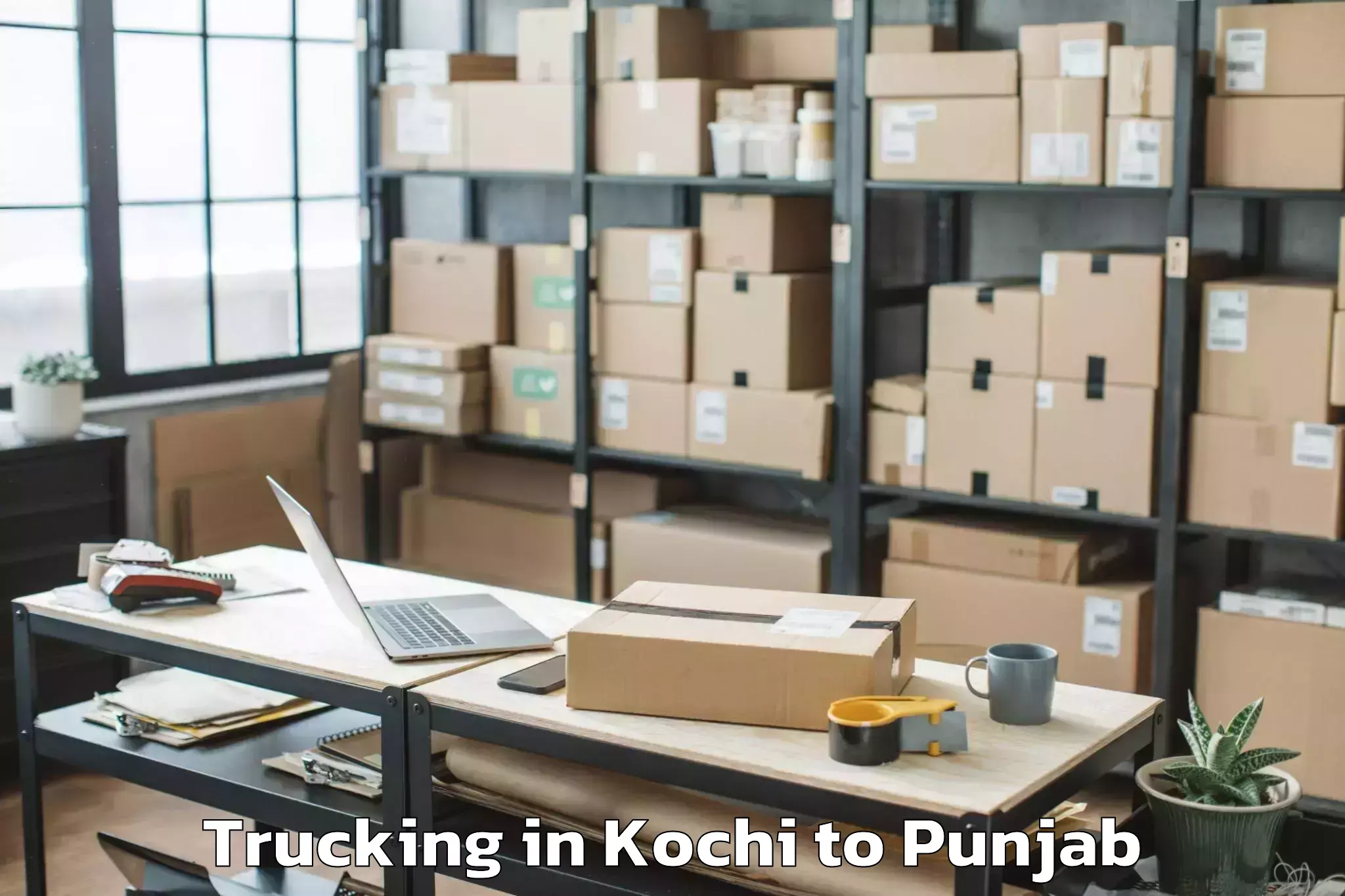 Book Kochi to Sri Guru Ram Das University Of Trucking Online